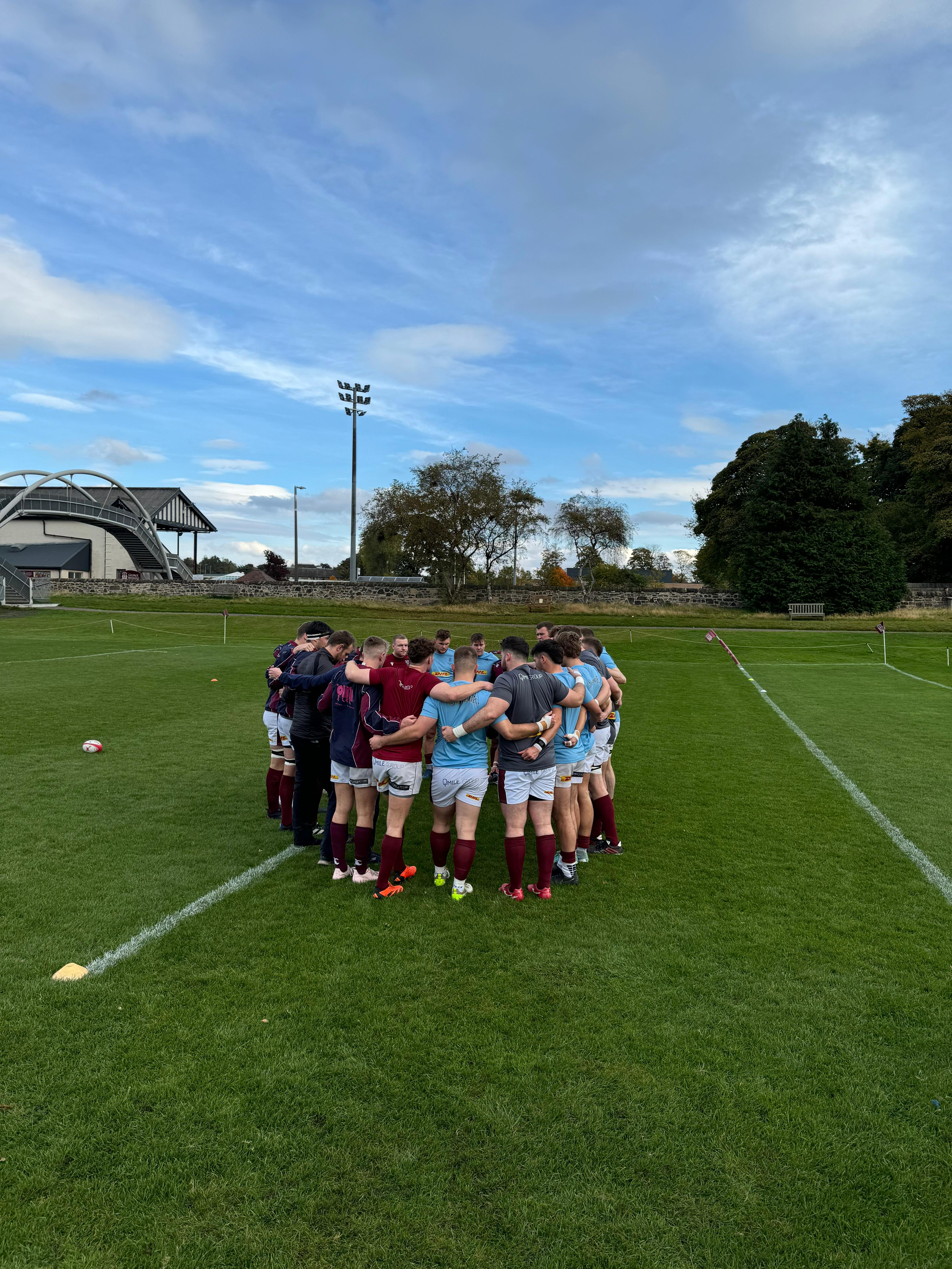 Sports team huddle